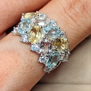 Morganite and aquamarine cluster ring, with white zircon accents.